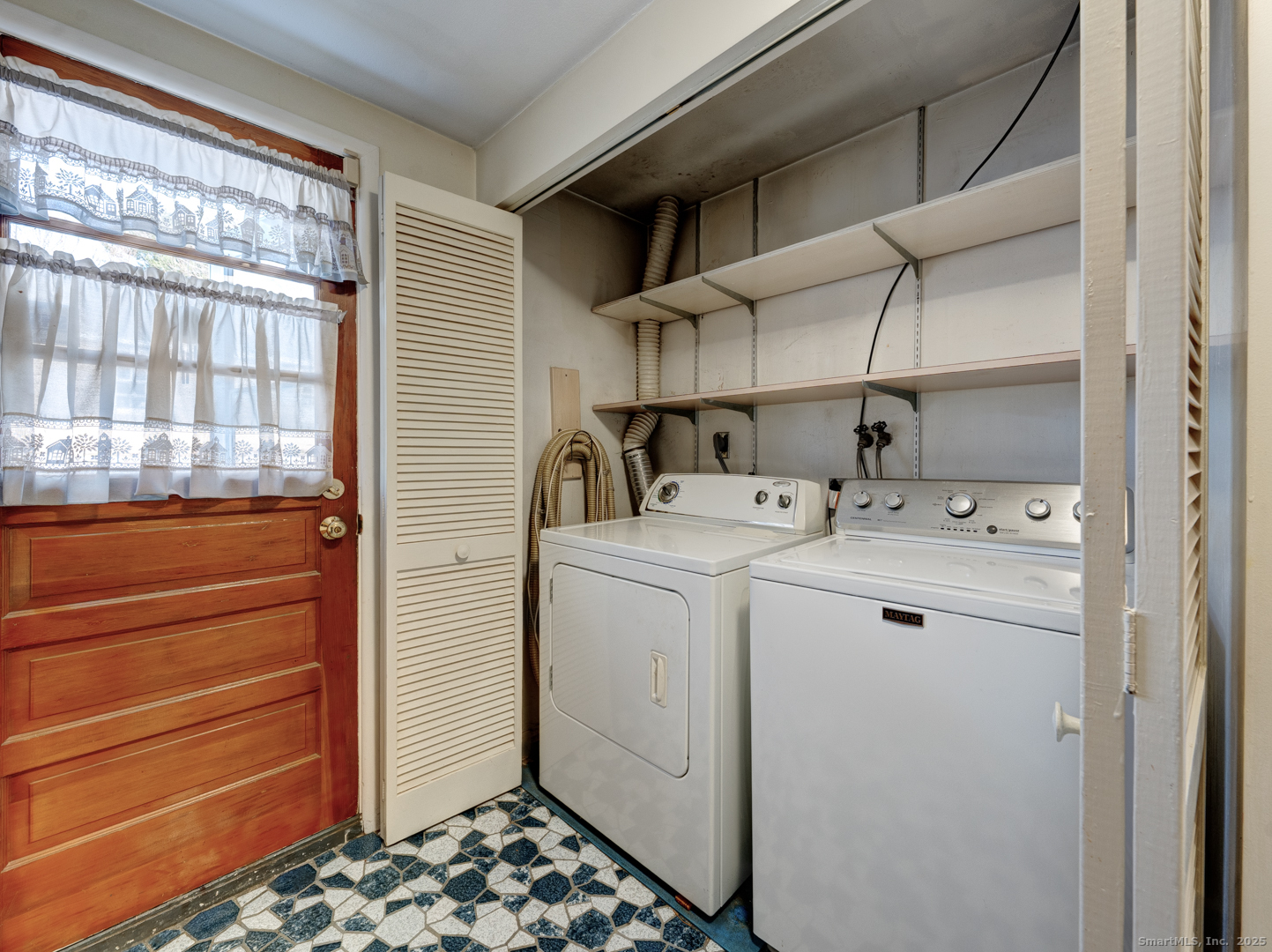 10 McKay Street Torrington, CT 06790 - Photo 25 of 39 a utility room with dryer and washer