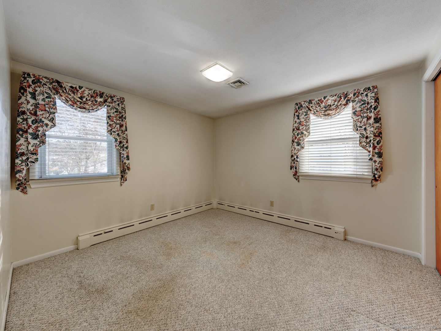 10 McKay Street Torrington, CT 06790 - Photo 28 of 39 an empty room with windows