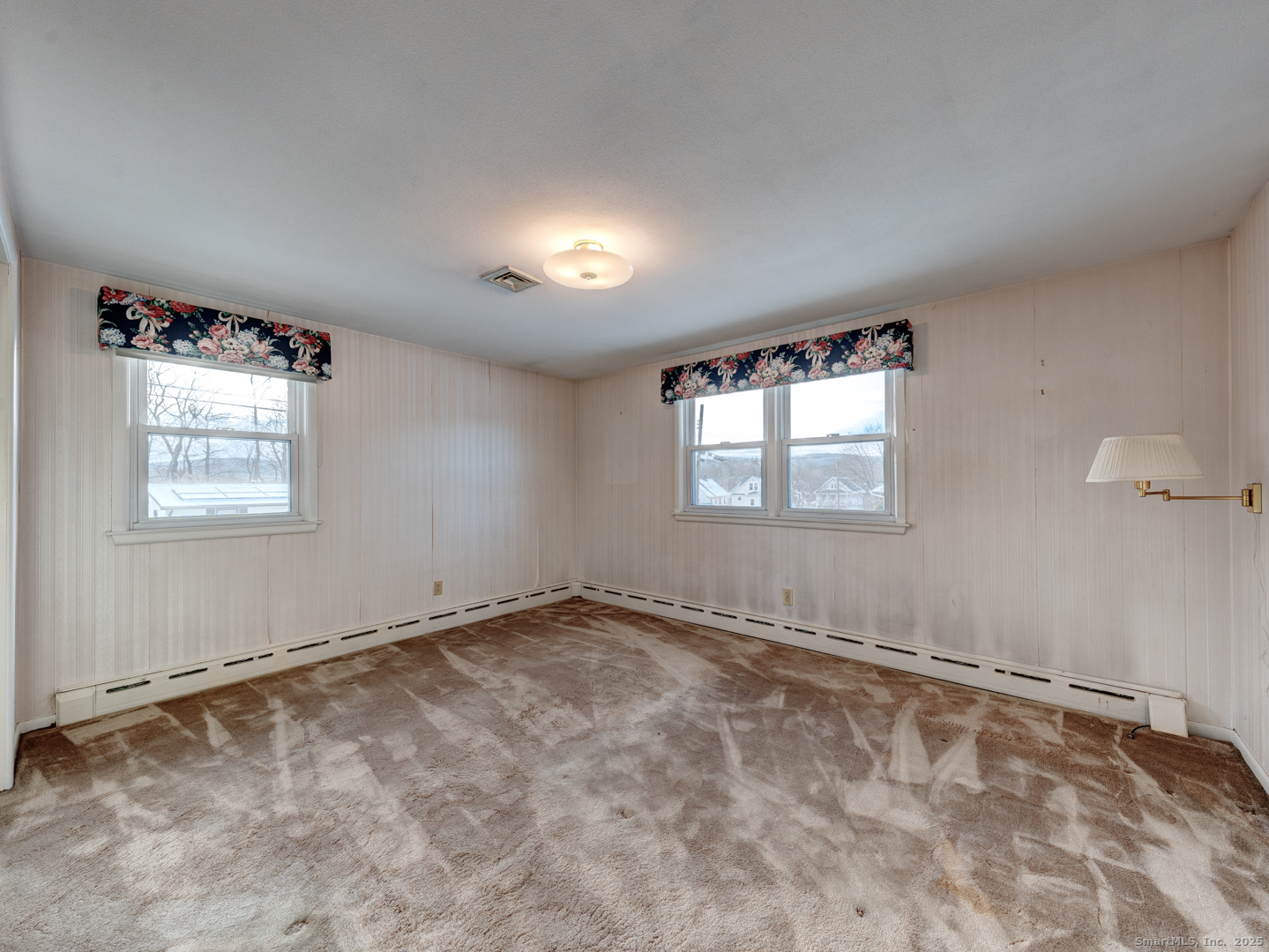 10 McKay Street Torrington, CT 06790 - Photo 30 of 39 an empty room with windows