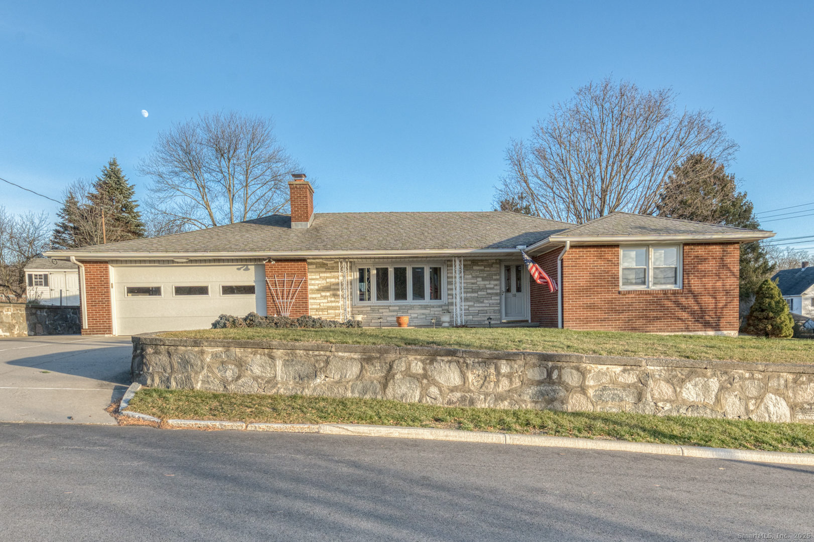 10 McKay Street Torrington, CT 06790 - Photo 3 of 39 a front view of a house with a yard