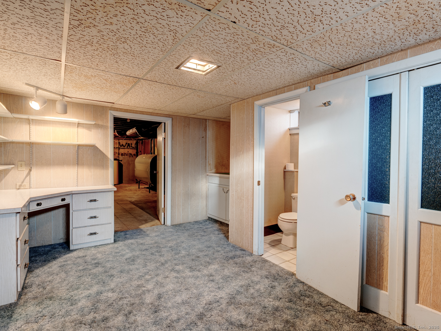 10 McKay Street Torrington, CT 06790 - Photo 34 of 39 a room with a dresser and mirror