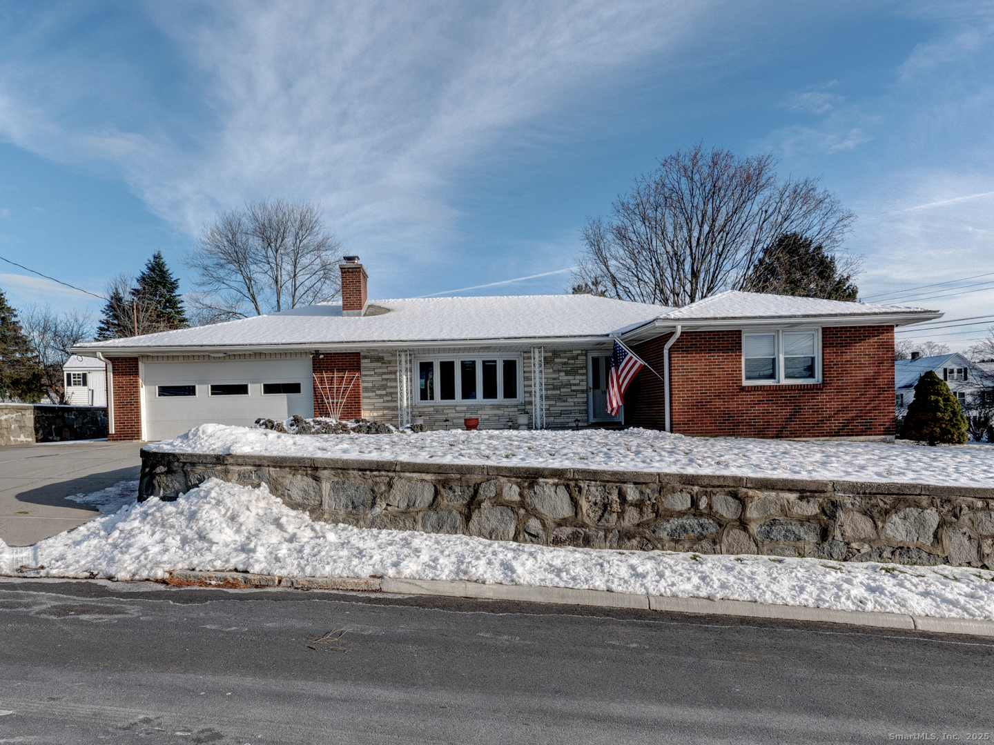 10 McKay Street Torrington, CT 06790 - Photo 4 of 39 a front view of a house with a yard