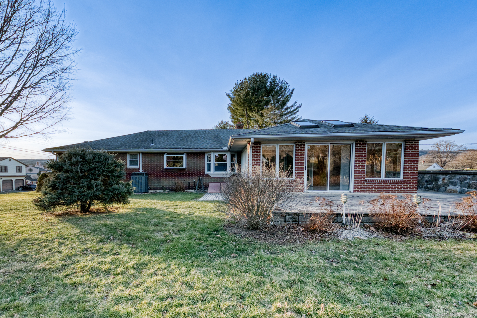10 McKay Street Torrington, CT 06790 - Photo 7 of 39 a front view of a house with a yard