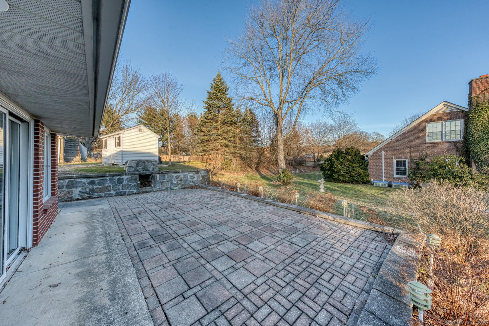 10 McKay Street Torrington, CT 06790 - Photo 8 of 39 a view of backyard with outdoor seating