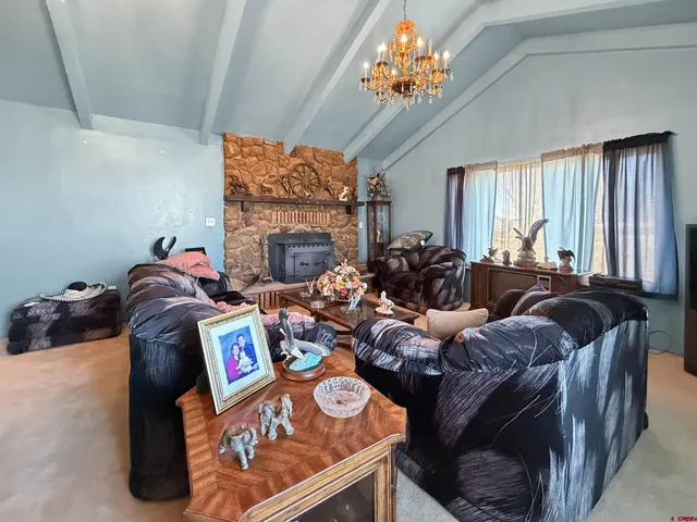 a bed room with bed and a fireplace