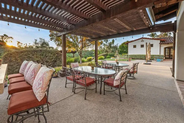 a view of swimming pool with a patio