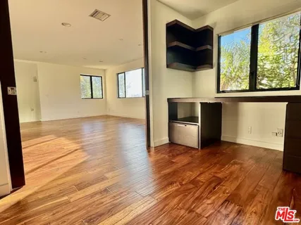 a view of a room with a window