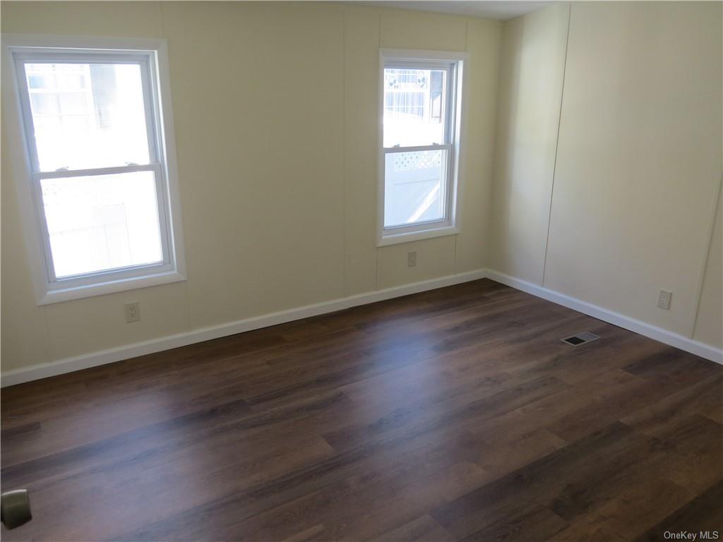 723 Beekman Road Hopewell Junction, NY 12533 - Photo 15 of 33 Spare room featuring dark hardwood / wood-style floors