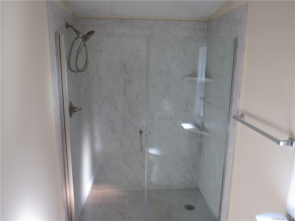 723 Beekman Road Hopewell Junction, NY 12533 - Photo 21 of 33 Bathroom with a shower with door
