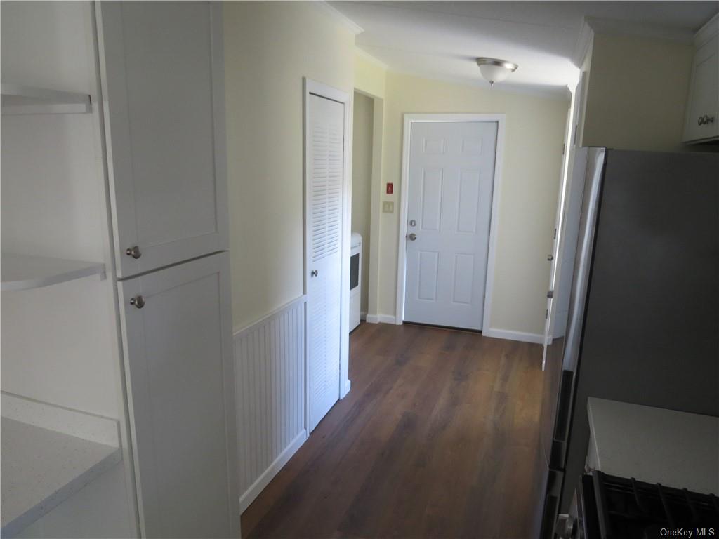 723 Beekman Road Hopewell Junction, NY 12533 - Photo 32 of 33 Hall with dark wood-type flooring