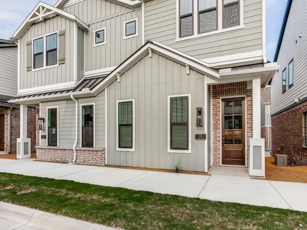 a view of house with yard