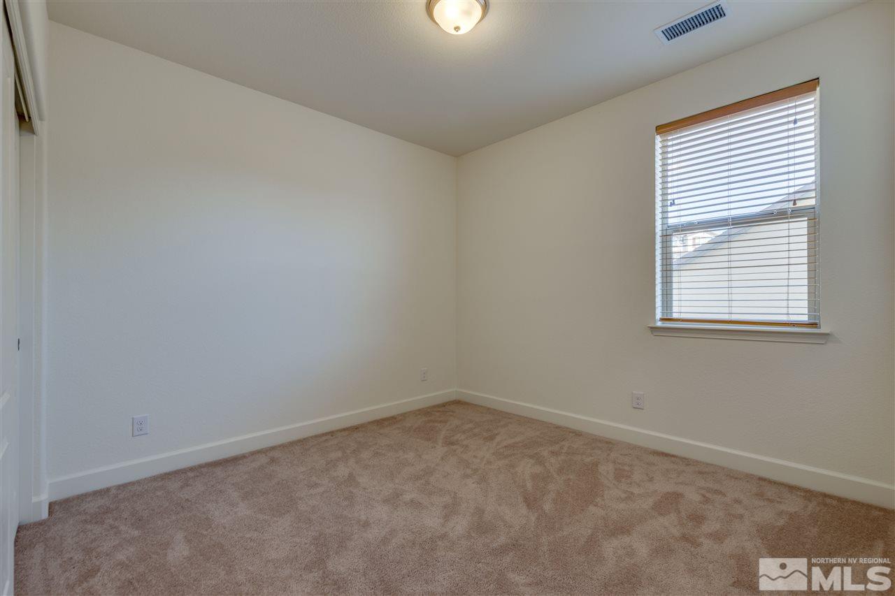8845 Winter Peace Court Reno, NV 89523 - Photo 20 of 23 an empty room with a window