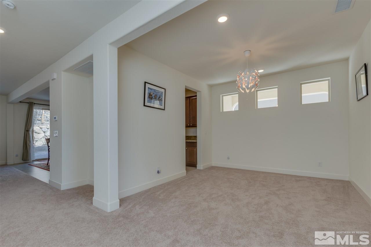 8845 Winter Peace Court Reno, NV 89523 - Photo 7 of 23 a view of an empty room