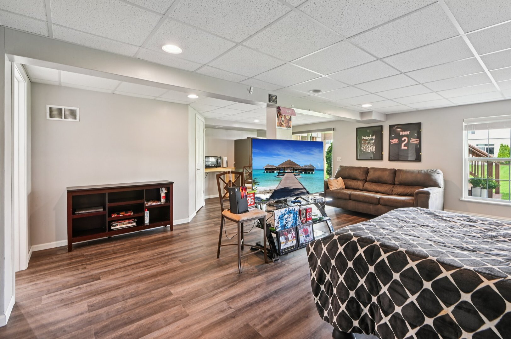 24734 South Dart Road Manhattan, IL 60442 - Photo 20 of 29 a living room with furniture a fireplace and wooden floor