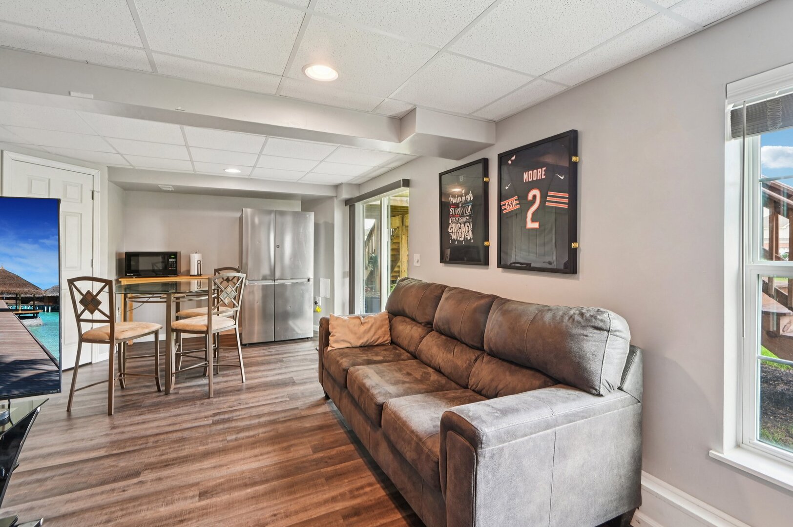 24734 South Dart Road Manhattan, IL 60442 - Photo 21 of 29 a living room with furniture a wooden floor and a window