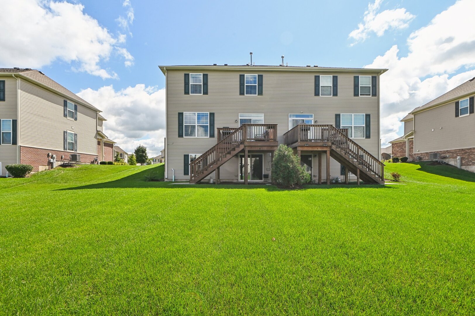 24734 South Dart Road Manhattan, IL 60442 - Photo 27 of 29 a front view of house with yard and outdoor seating