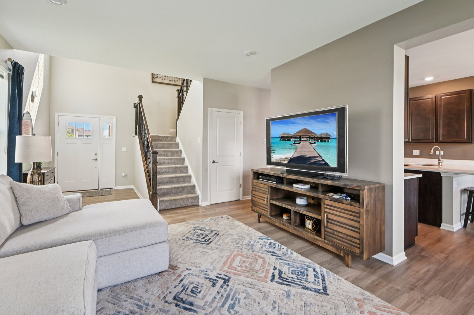 24734 South Dart Road Manhattan, IL 60442 - Photo 4 of 29 a living room with furniture and a flat screen tv
