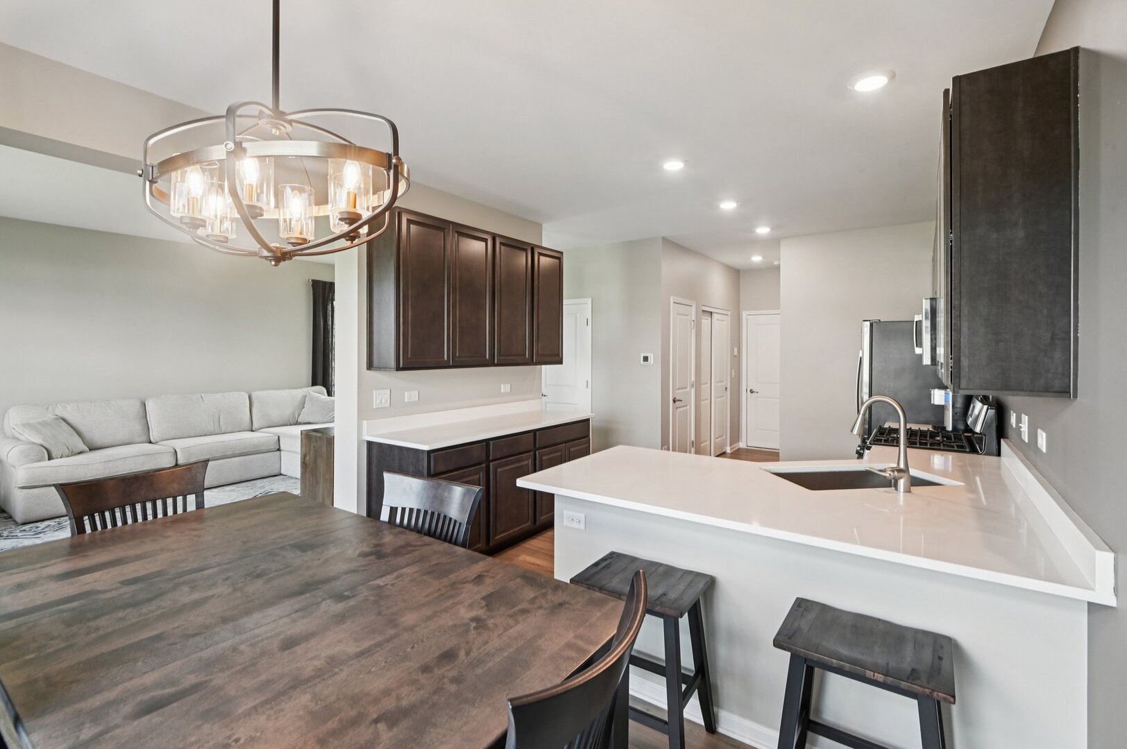 24734 South Dart Road Manhattan, IL 60442 - Photo 10 of 29 a large kitchen with a table and chairs