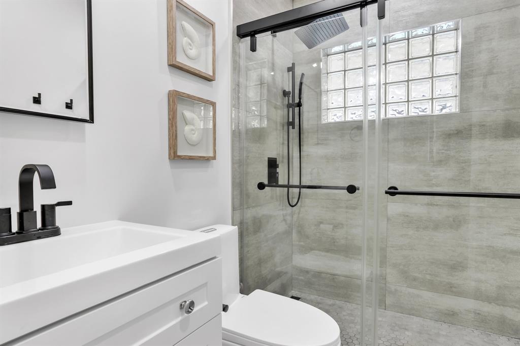 421 Southeast 14th Avenue Pompano Beach, FL 33060 - Photo 11 of 31 a bathroom with a sink toilet and shower