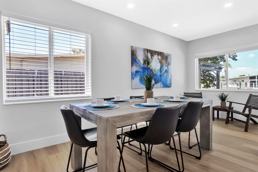 421 Southeast 14th Avenue Pompano Beach, FL 33060 - Photo 16 of 31 a view of a dining room with furniture window and wooden floor