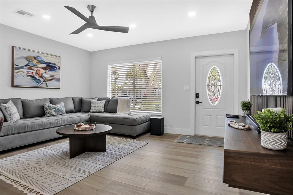421 Southeast 14th Avenue Pompano Beach, FL 33060 - Photo 24 of 31 a living room with furniture and wooden floor