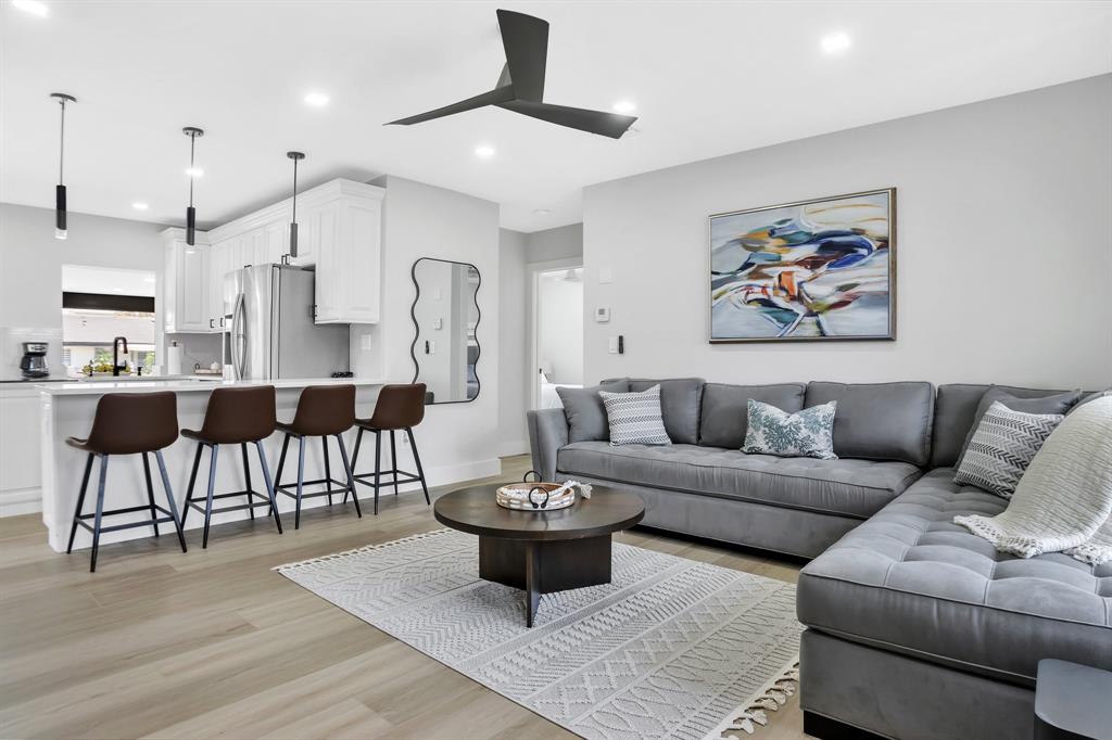 421 Southeast 14th Avenue Pompano Beach, FL 33060 - Photo 8 of 31 a living room with furniture and a large window