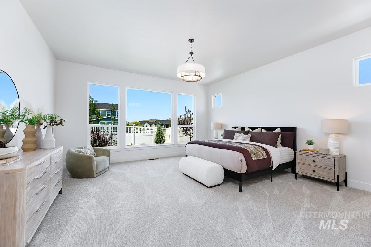 13265 North Spring Creek Way Boise, ID 83714 - Photo 11 of 35 Bedroom with light colored carpet