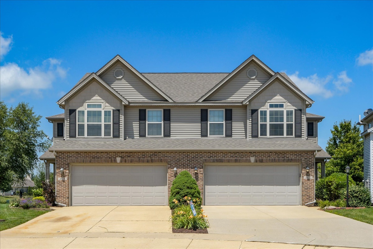 4622 Copper Ridge Road, Unit 4622 Champaign, IL 61822 - Photo 1 of 25 a house with a outdoor space