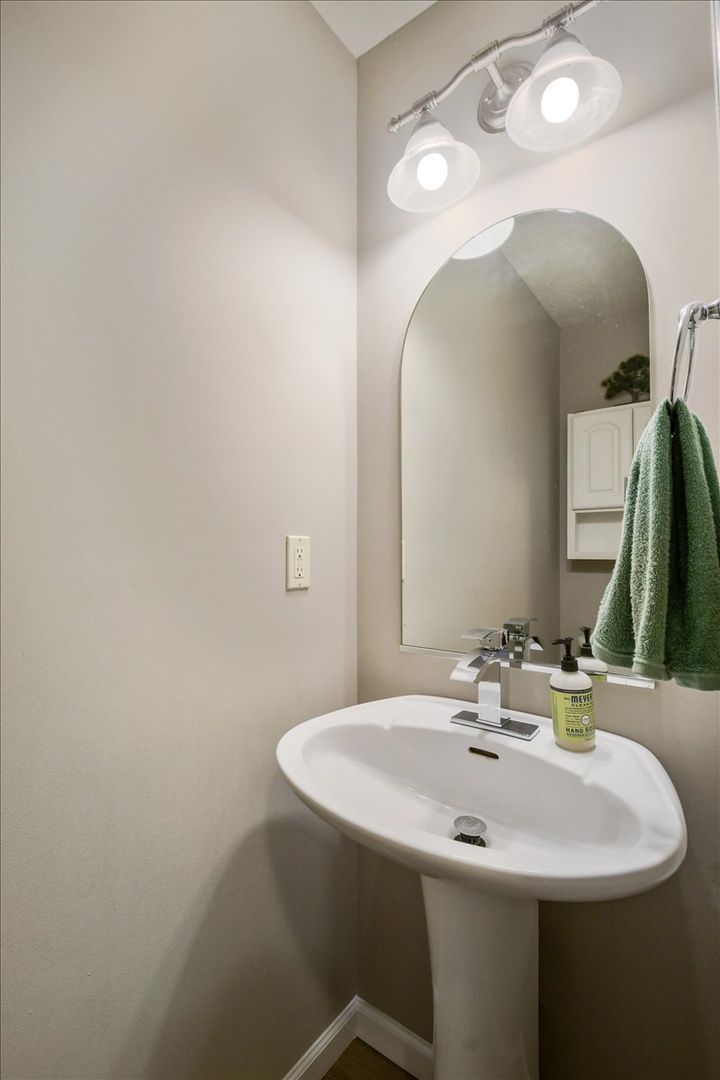 4622 Copper Ridge Road, Unit 4622 Champaign, IL 61822 - Photo 9 of 25 a bathroom with a sink and a mirror