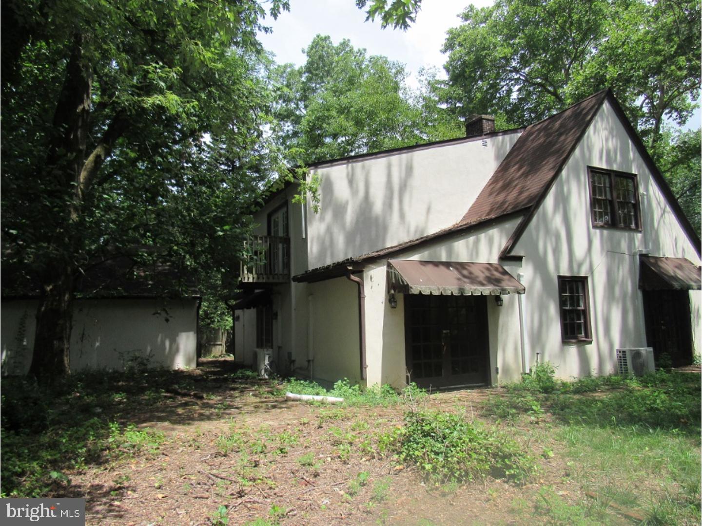 433 Bridgeboro Road Moorestown, NJ 08057 - Photo 4 of 24 a view of a house with a yard