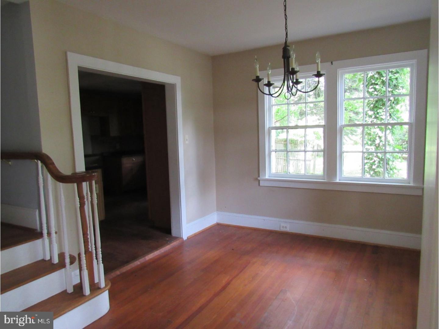 433 Bridgeboro Road Moorestown, NJ 08057 - Photo 8 of 24 a view of an empty room with wooden floor and a window