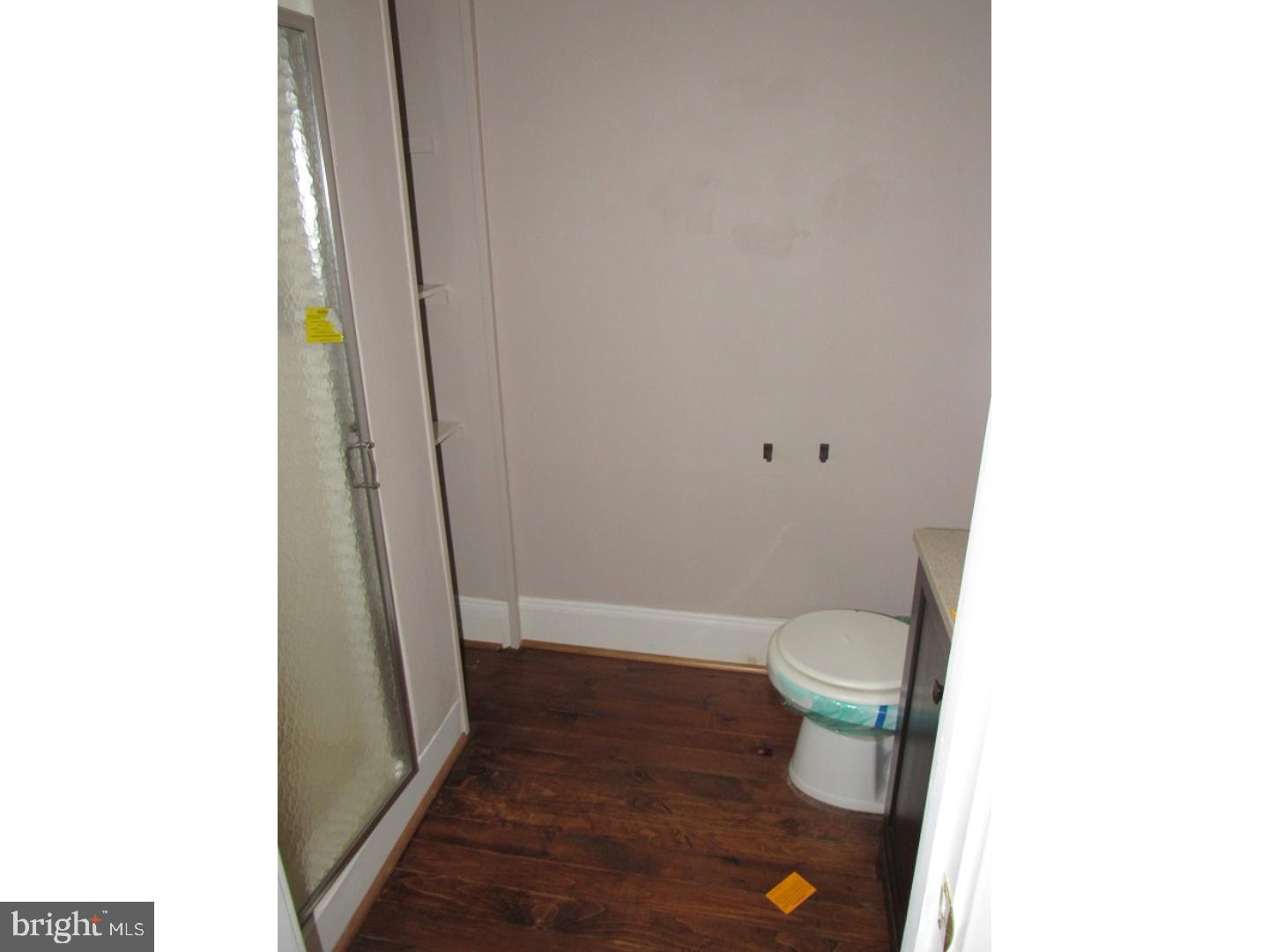 433 Bridgeboro Road Moorestown, NJ 08057 - Photo 9 of 24 a bathroom with a sink and a toilet