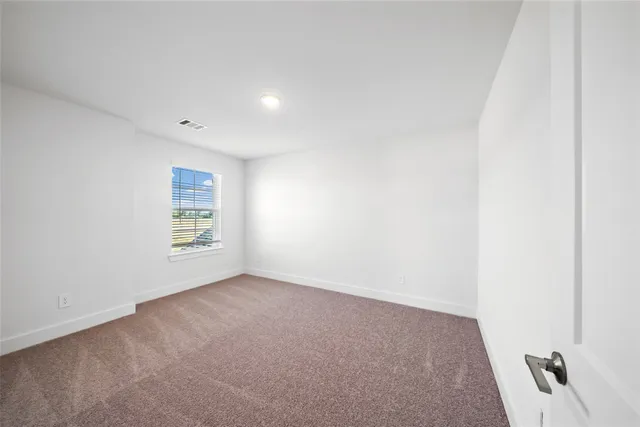 a bathroom with a double vanity sink and mirror