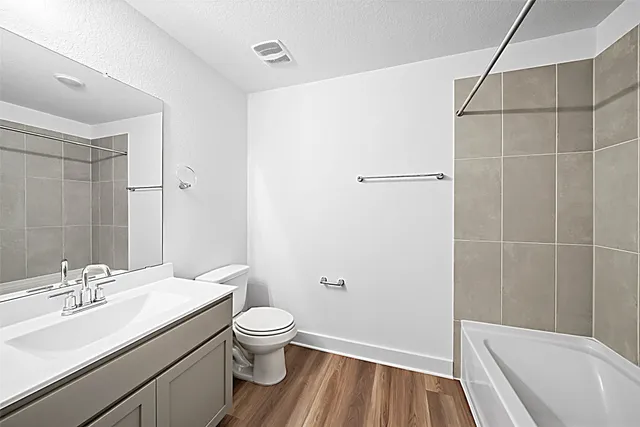 a view of a house with backyard and porch