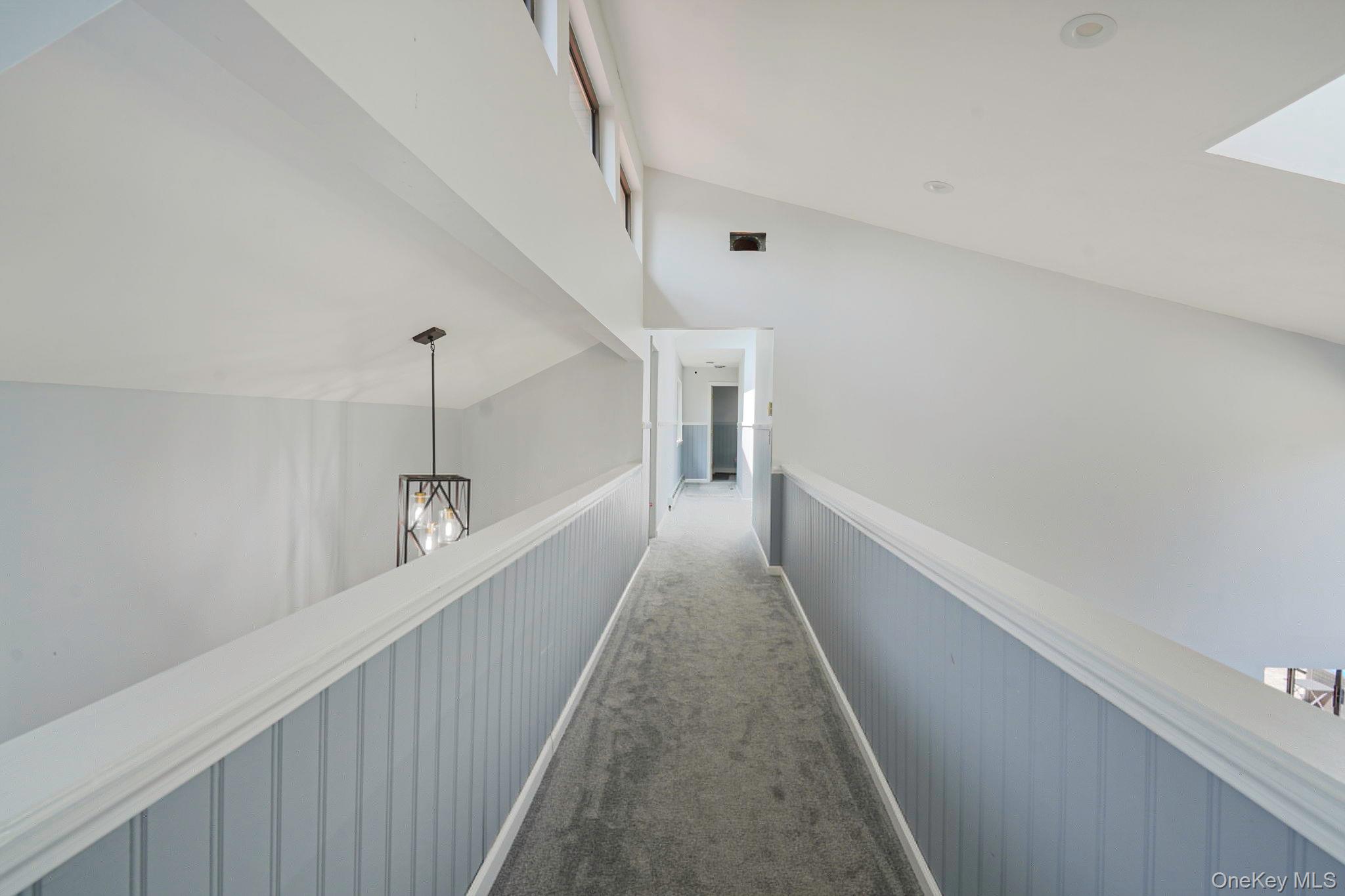 318 Sheep Pasture Road East Setauket, NY 11733 - Photo 23 of 45 a view of a hallway with closet