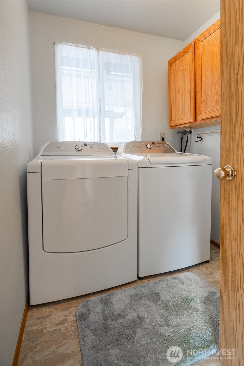14031 33rd Place South Tukwila, WA 98168 - Photo 21 of 37 a utility room with dryer and washer