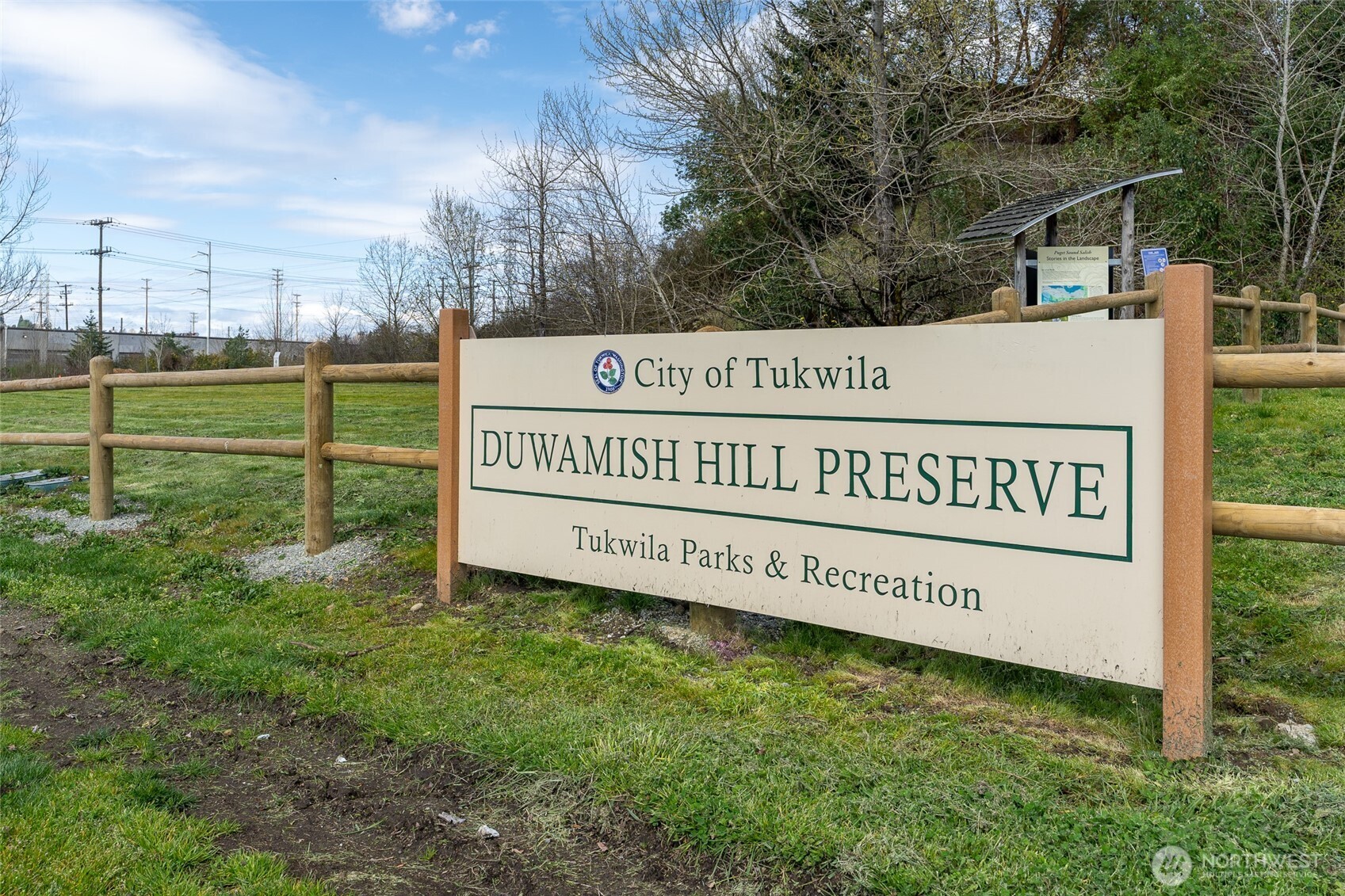 14031 33rd Place South Tukwila, WA 98168 - Photo 35 of 37 a view of a park with welcome board