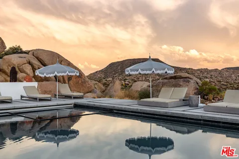 a view of a terrace with chairs