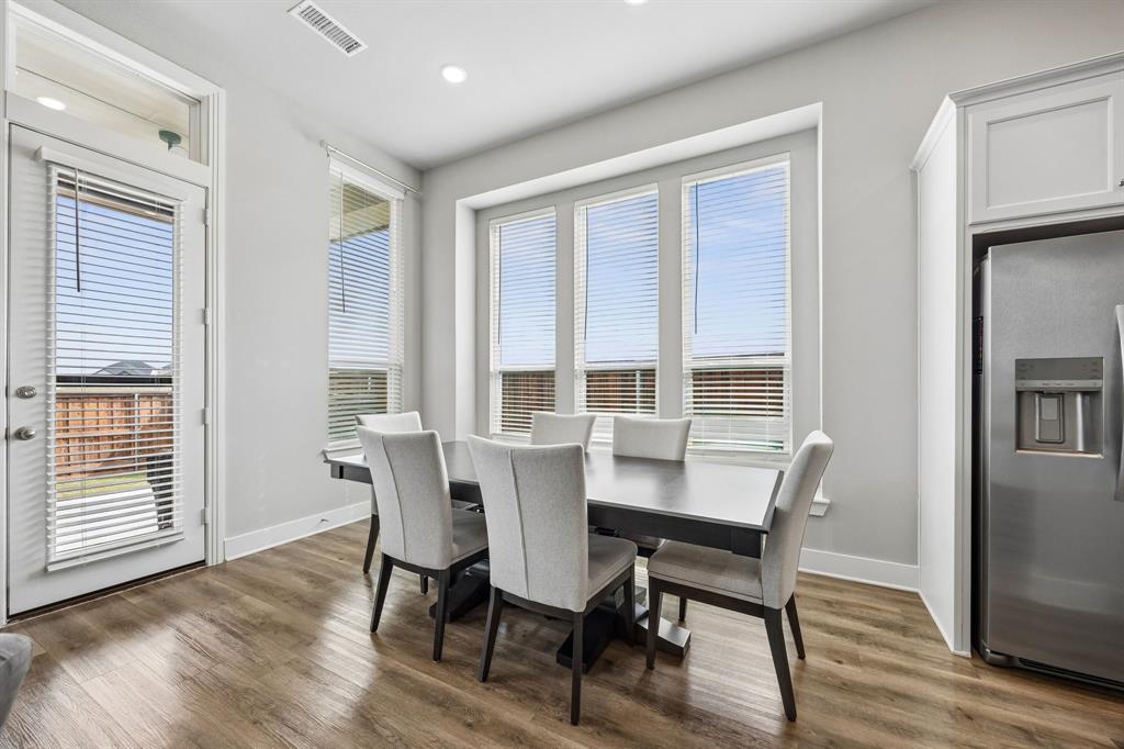 2430 Brightling Bend Forney, TX 75126 - Photo 21 of 37 Dining area featuring recessed lighting and dark wood-type flooring