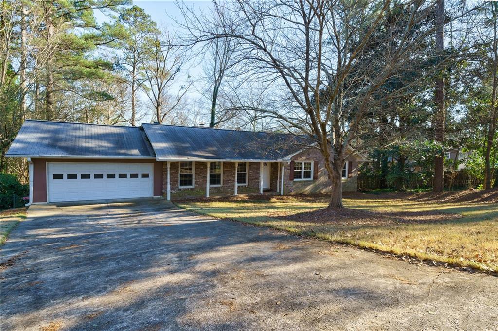 591 Smithstone Road Southeast Marietta, GA 30067 - Photo 1 of 1 Well Built Ranch With 2 Masonry Fireplaces and Open Concept!