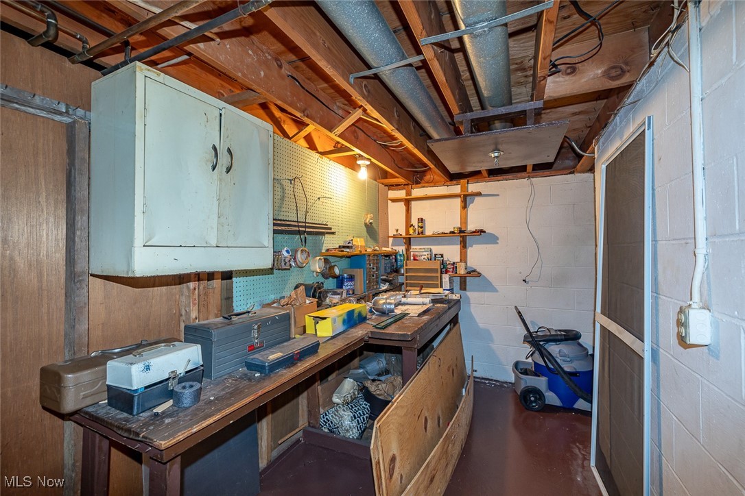 750 Sagamore Road Northfield, OH 44067 - Photo 31 of 37 Basement with a workshop area