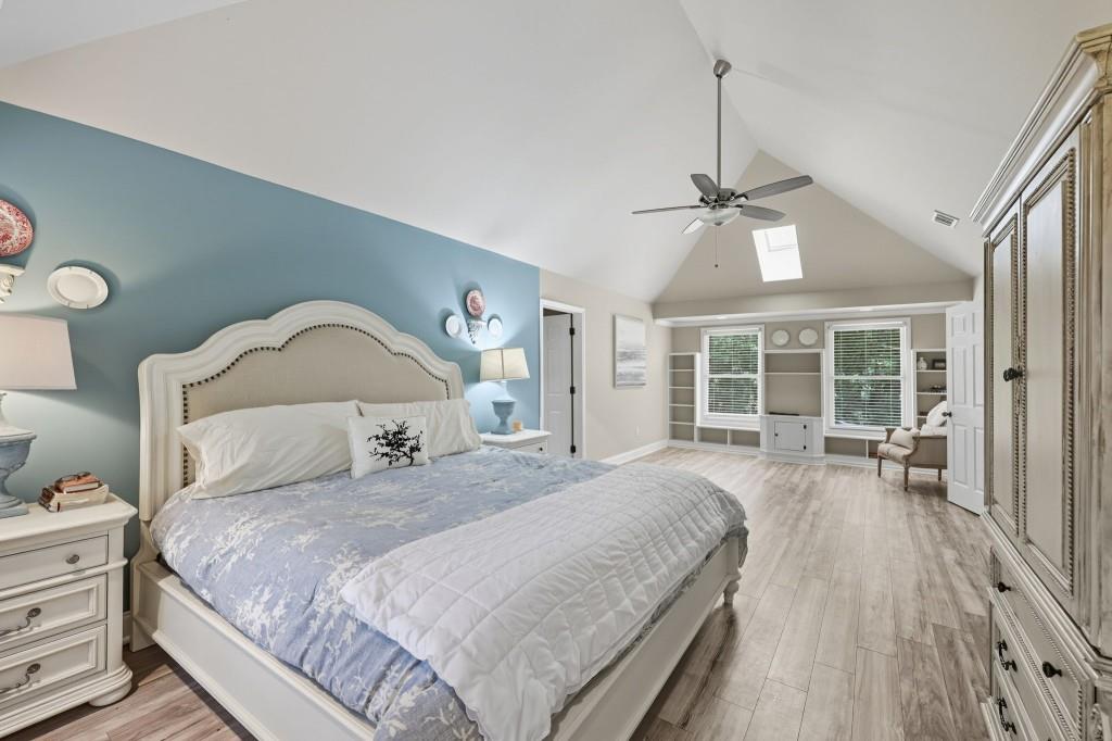 3810 Hardy Place Gainesville, GA 30506 - Photo 11 of 34 a bedroom with a large bed and a large window