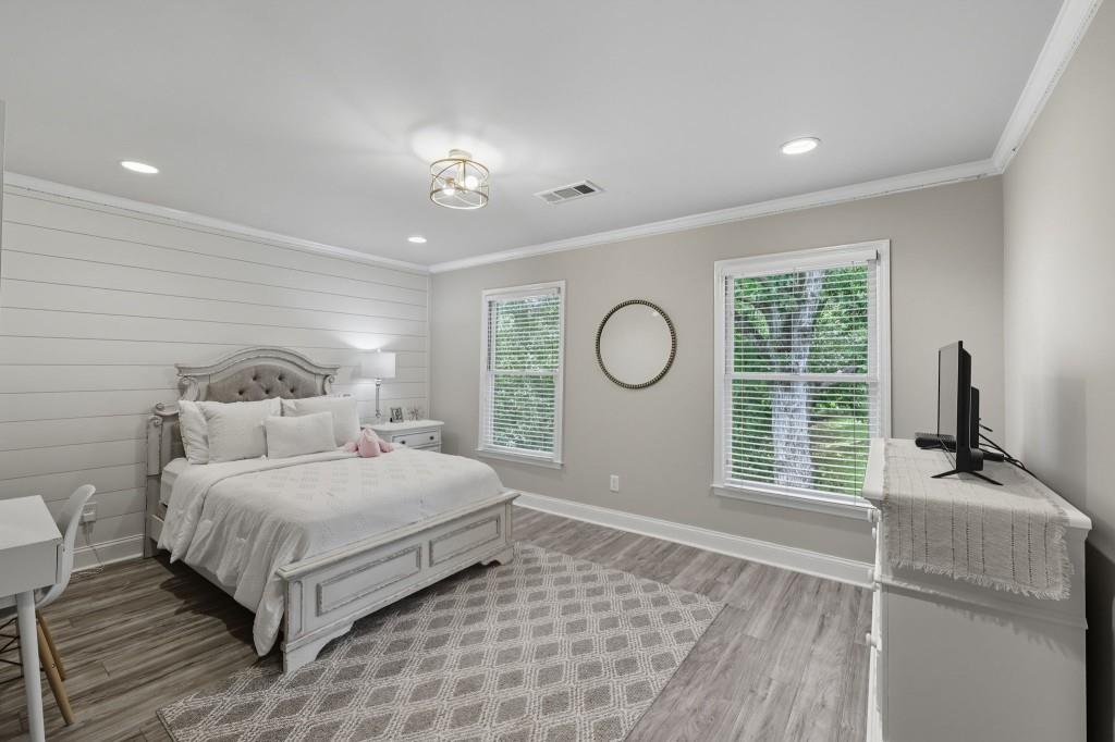 3810 Hardy Place Gainesville, GA 30506 - Photo 18 of 34 a bedroom with a large bed and a window