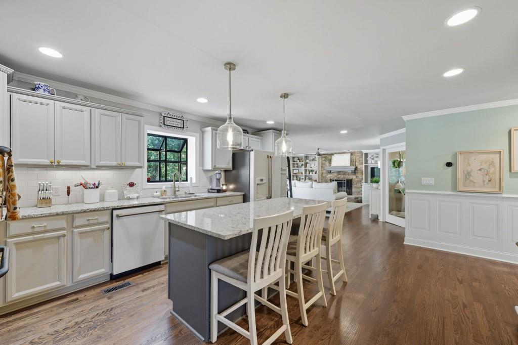 3810 Hardy Place Gainesville, GA 30506 - Photo 28 of 34 a large kitchen with a table and chairs