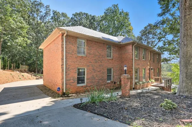 a backyard of a house with lots of green space