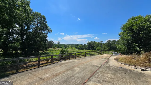 a view of backyard with green space