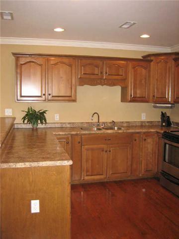 136 Fieldstone Lane Springfield, TN 37172 - Photo 7 of 18 Open Kitchen- Spacious, with Hardwood floors and Crown Molding