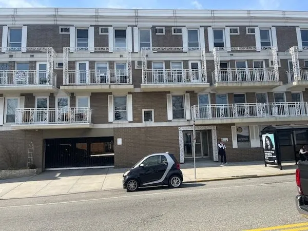 a car parked in front of a building