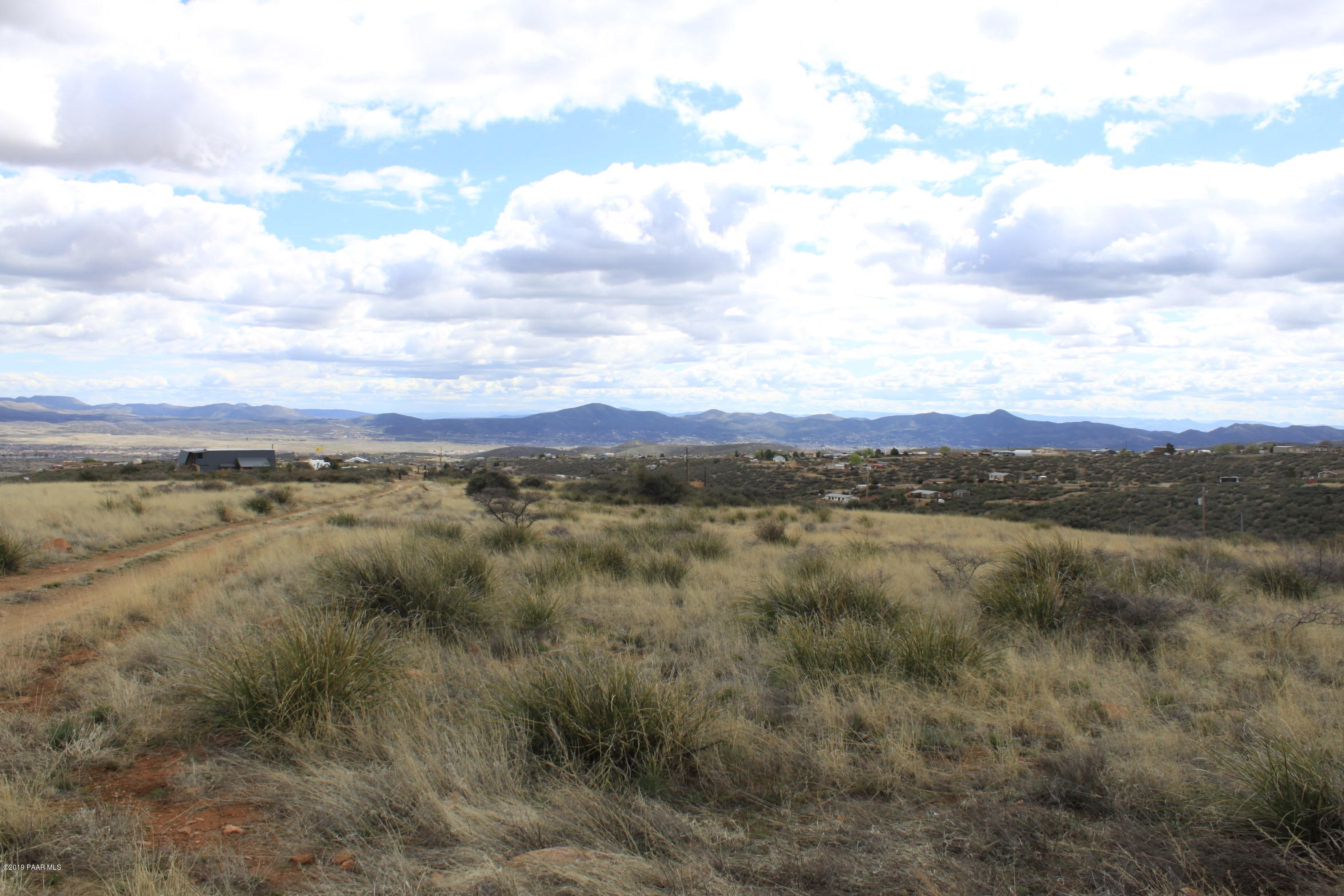 9240 Wolf Road Dewey-Humboldt, AZ 86327 - Photo 3 of 14 a view of a city with lush green forest