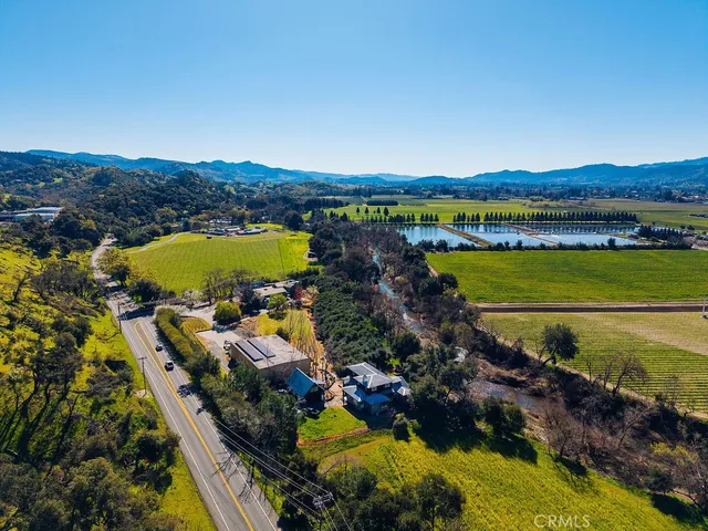 a view of a city and mountains ocean view